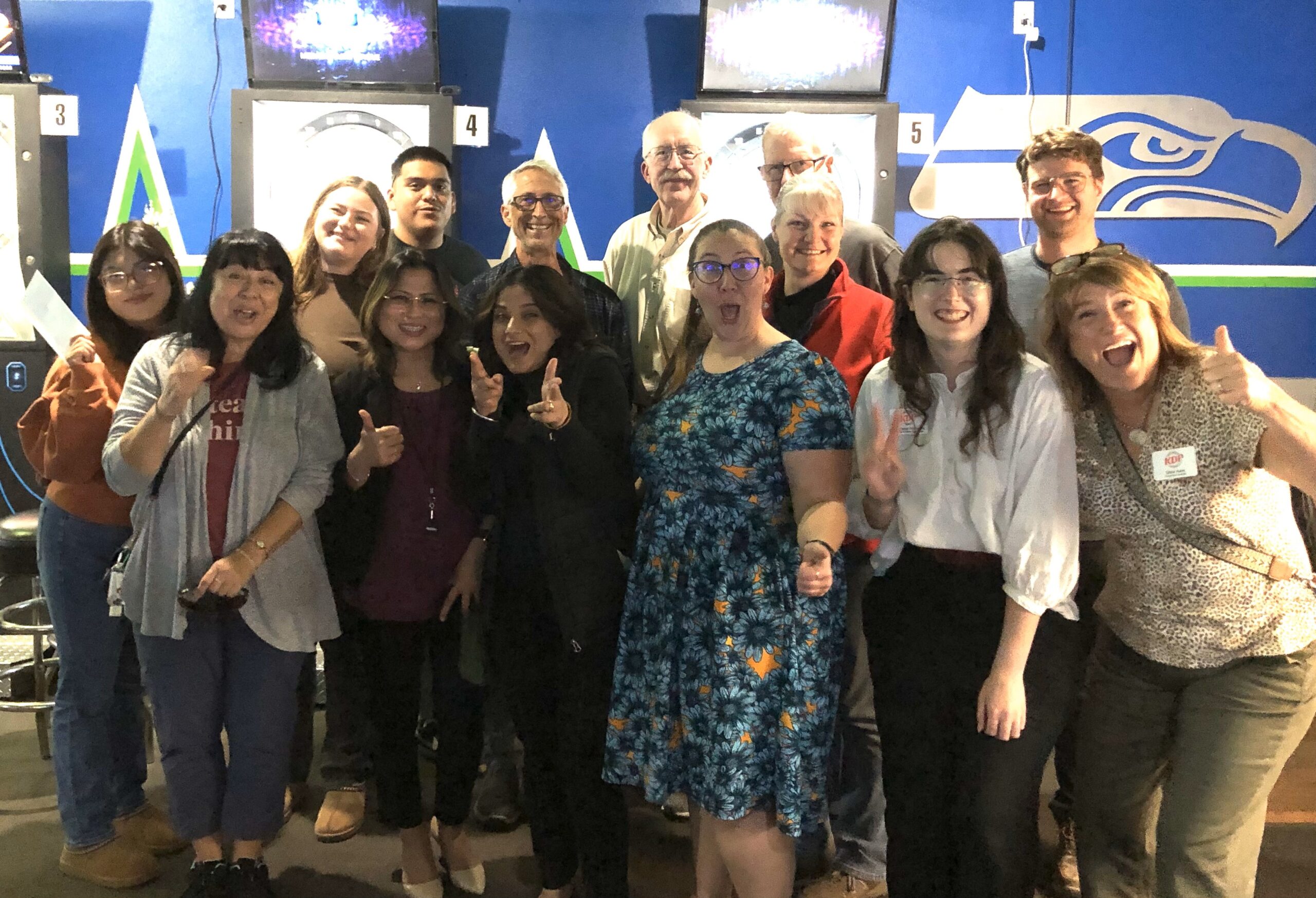 A group of people posing for a picture at the volunteer mixer